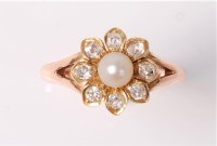 Lot 2511 - A pearl and diamond flowerhead cluster ring,...