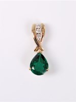 Lot 2528 - A 9ct synthetic emerald and diamond pendant,...