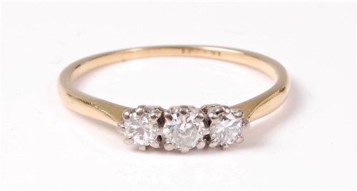 Lot 2530 - An 18ct and platinum three stone diamond ring,...