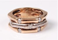 Lot 2532 - A bi-coloured 9ct diamond ring, the three...