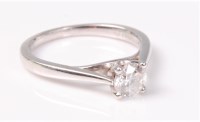 Lot 2544 - An 18ct single stone diamond ring, the round...