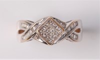 Lot 2547 - A diamond ring, the central pave set panel...