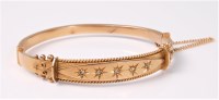 Lot 2551 - A diamond bangle, the slightly tapered bangle...