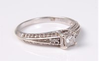 Lot 2560 - A 9ct diamond ring, the princess cut diamond,...