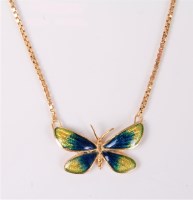 Lot 2563 - An enamel butterfly pendant, the blue and...