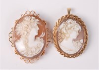 Lot 2575 - Two cameo brooches, the first an oval shell...