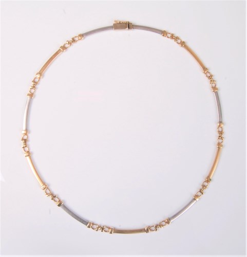 Lot 2584 - A bi-coloured 14ct gold necklace by Cetas, the...