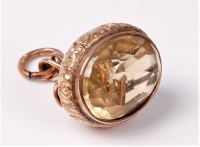 Lot 2594 - A 9ct citrine fob, the oval citrine approx....