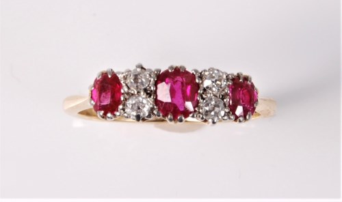 Lot 2597 - An 18ct and platinum ruby and diamond ring,...
