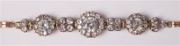 Lot 2607 - A zircon and white hardstone bracelet, the...
