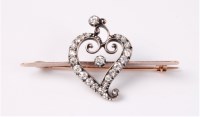 Lot 2614 - A diamond heart shaped brooch, the open heart...