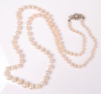 Lot 2624 - A graduated cultured pearl necklace, the...