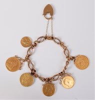 Lot 2643 - A 9ct coin bracelet, the curblink style...