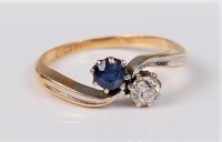 Lot 2651 - An 18ct sapphire and diamond 'toi et moi' ring,...