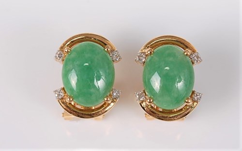 Lot 2664 - At pair of 18ct jade and diamond earstuds, the...