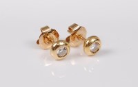 Lot 2678 - A pair of 18ct diamond earstuds, the round...