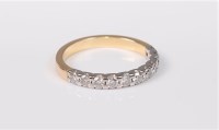 Lot 2679 - A half hoop diamond eternity ring, the round...