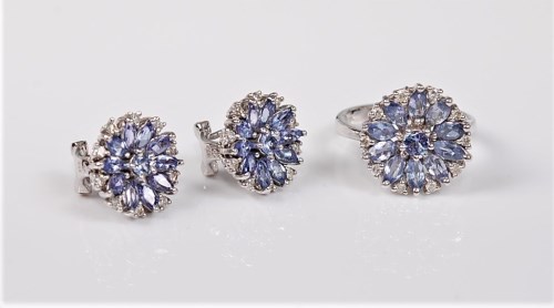 Lot 2702 - An 18ct white gold tanzanite ring and a pair...