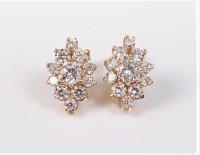 Lot 2715 - A pair of 9ct and CZ cluster earrings, the...