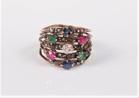 Lot 2716 - A multi gemset ring, the five fine bands of...