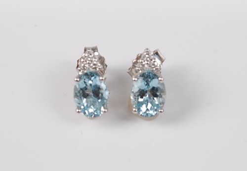 Lot 2721 - A pair of 18ct white gold aquamarine and...