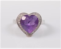 Lot 2729 - A 9ct white gold heart shaped amethyst and...