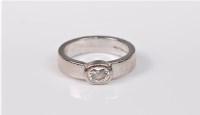 Lot 2733 - An 18ct white gold single stone diamond ring,...