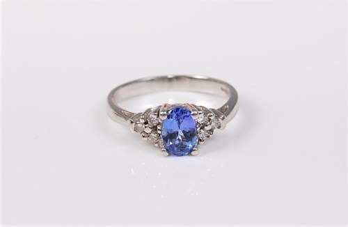 Lot 2734 - A tanzanite and diamond platinum ring, the...