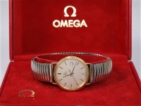 Lot 2738 - A gentleman's Omega wristwatch, the round buff...