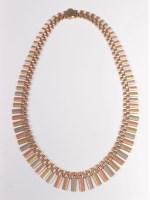 Lot 2739 - A 9ct tri-coloured gold fringe necklace, the...