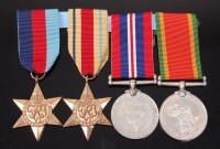 Lot 1008 - A WW II group of four to include 1939-1945...