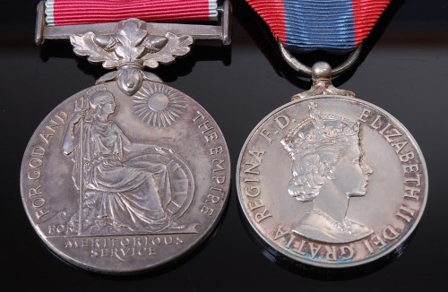 Lot 1017 - An E.R. II. British Empire medal and Imperial...