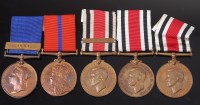 Lot 1041 - A group of five Metropolitan Police medals to...