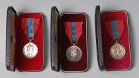 Lot 1066 - Three E.R. II. Imperial Service medals, naming...