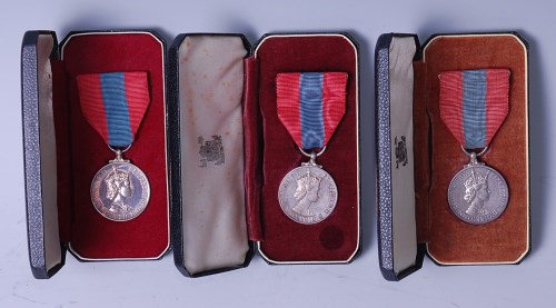 Lot 1067 - Three E.R. II. Imperial Service medals, naming...