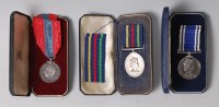 Lot 1068 - A George V. Imperial Service medal, naming...