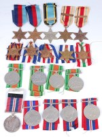 Lot 1077 - A large collection of WW II medals to include...