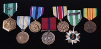 Lot 1079 - A collection of seven U.S. Service medals to...