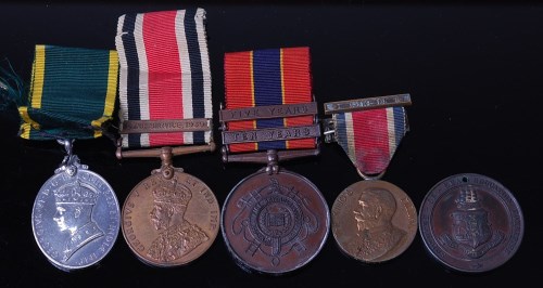 Lot 1084 - A collection of five miscellaneous medals to...