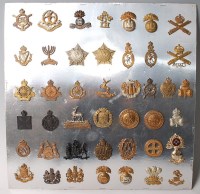Lot 1098 - A large collection of assorted cap badges and...