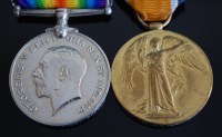 Lot 1127 - A WW I British War and Victory duo, naming...