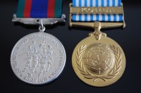 Lot 1135 - A Canadian Volunteer Service medal (1939-45),...