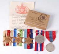 Lot 1194 - A WW II group of four to include 1939-45 Star,...