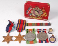 Lot 1210 - A group of four WW II medals to include...