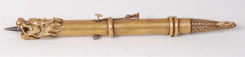 Lot 1214 - A Chinese brass assasins sleeve gun, having a...