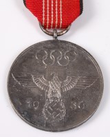 Lot 1216 - A German 1936 Olympic Games Commemorative medal.