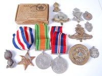 Lot 1240 - A group of three WW II medals to include...