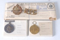 Lot 1257 - A WW I British War and Victory duo, naming...