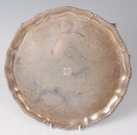 Lot 1268 - A mid-20th century silver salver of circular...