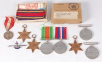 Lot 1301 - A group of four WW II medals to include...